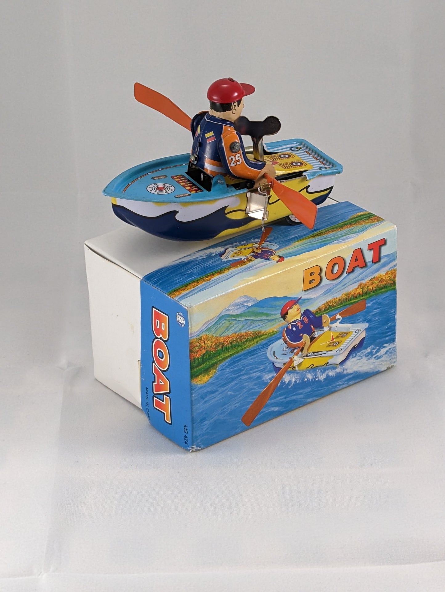 Retro Wind Up Boy In Boat